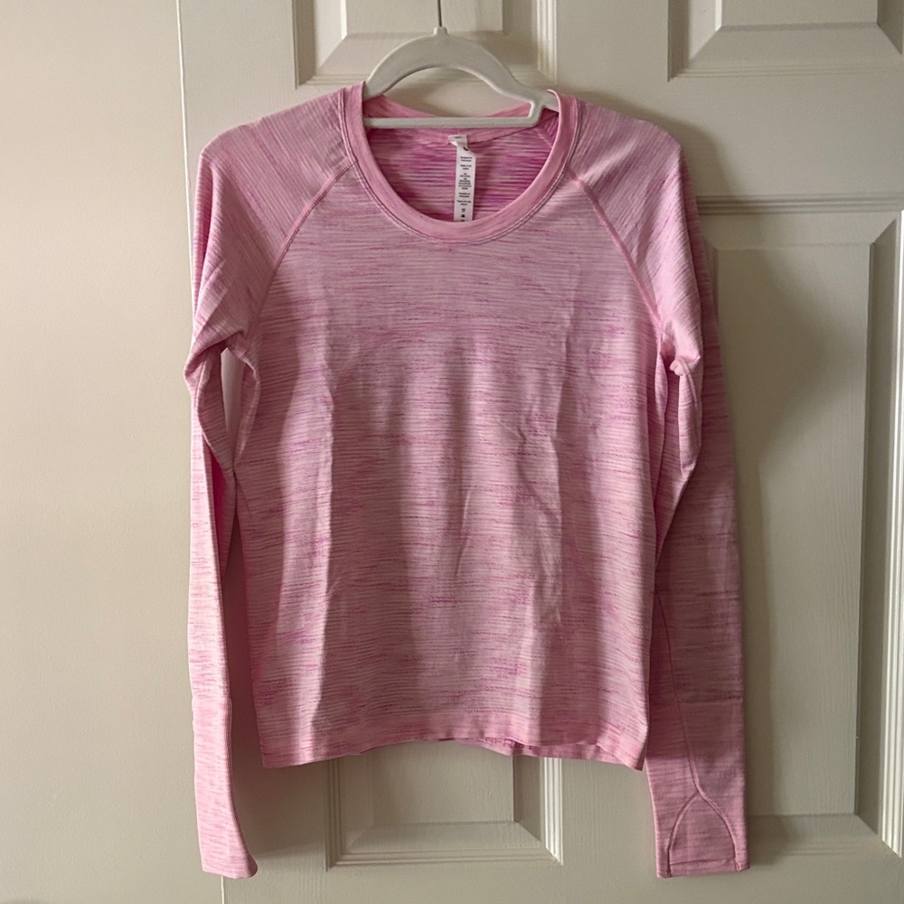 Lululemon Athletica Pink Heathered Long Sleeve Top. Hip length